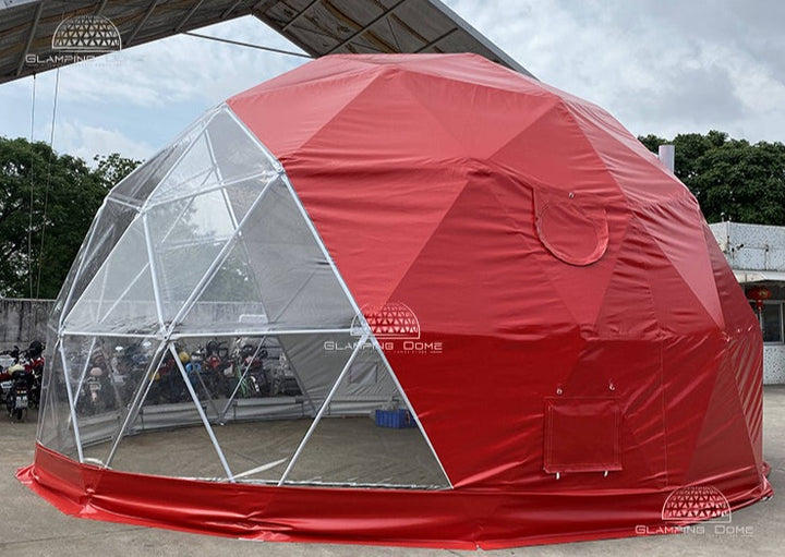 A striking 23-foot (8-meter) red geodesic dome tent by Glamping Dome Store, located in West Virginia, USA. Featuring a transparent panoramic window and a bold, weather-resistant PVC cover, this dome is ideal for unique event setups, outdoor gatherings, or temporary shelters. The durable PVC material ensures longevity and versatility, suitable for various climates and environments.